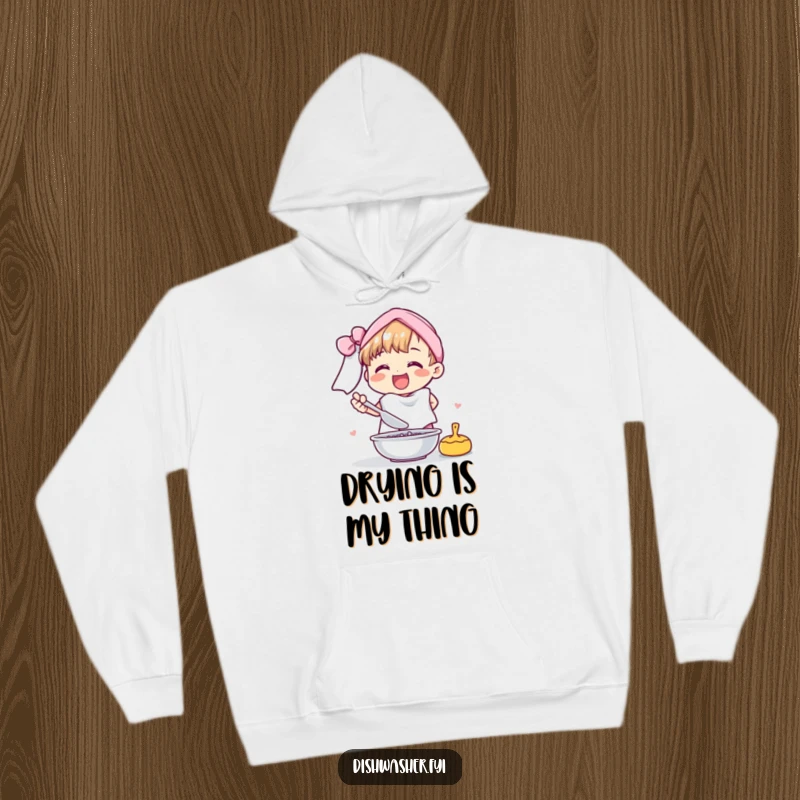 Funny hoodie depicts a cheerful character joyfully drying dishes with a fluffy towel, a cozy and amusing clothing item.
